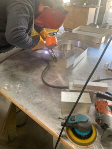 Halo Channel Letter Being Hand Welded